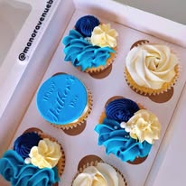 Box of six blue Father's Day cupcakes